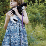 enfant avec chat intelligence artificielle santé animale