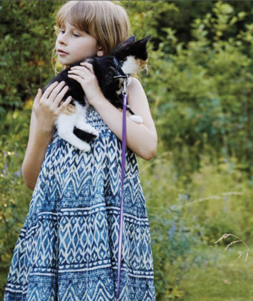enfant avec chat intelligence artificielle santé animale